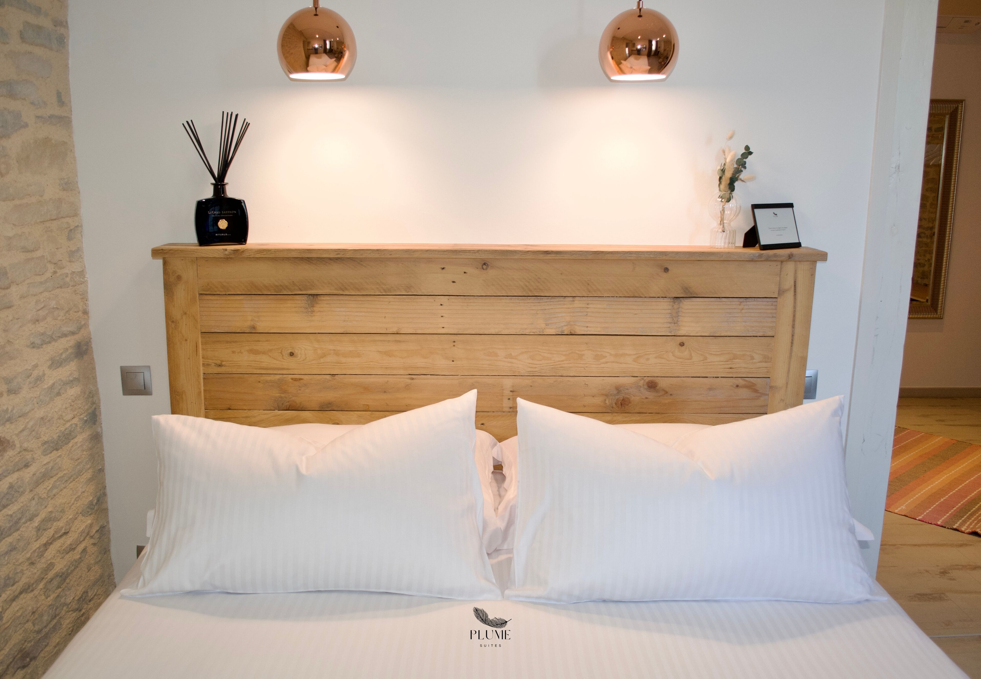 Down duvets, Select Comfort beds, minibar, individually decorated