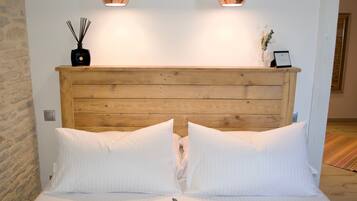 Down duvets, Select Comfort beds, minibar, individually decorated