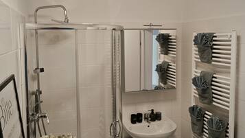 Hair dryer, towels, soap, shampoo