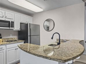 Private kitchen - Newly remodeled condo in the heart of Carillon Village with spectacular views! (Panama City Beach)