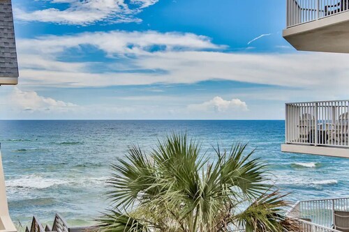 Beach view from balcony, community pool, walkable to restaurants & shopping!