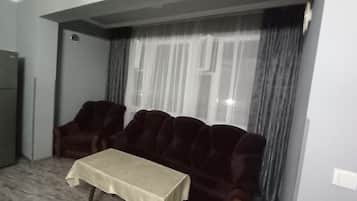 Kamar Comfort | Area keluarga | TV layar datar