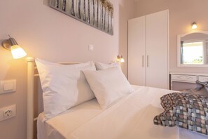 2 habitaciones, tabla de planchar con plancha y ropa de cama 