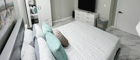 Iron/ironing board, travel crib, free WiFi, bed sheets