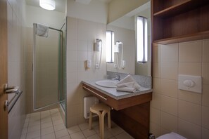 Hair dryer, towels, toilet paper
