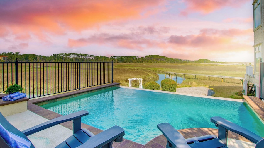 Steps to Beach, Infinity Pool + Hot Tub, Game Room Coastal Marsh by Avantstay