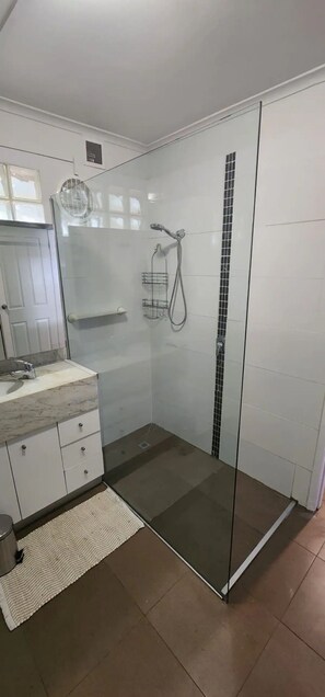 Shower, towels, soap, shampoo