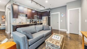 TV, fireplace, offices - The West End Flats (Roanoke)