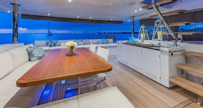 A stunning Lagoon 630 crewed power catamaran available in the Bahamas.