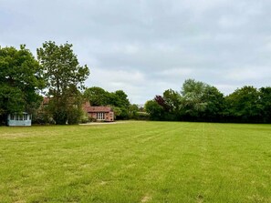 Property grounds - Delightful rural country cottage, Great for families and groups, large garden and a big hot tub! (Beccles)