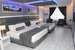 Suíte luxo | Roupas de cama premium, frigobar, individualmente mobiliados