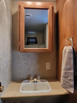 Eco-friendly toiletries, hair dryer, towels, soap