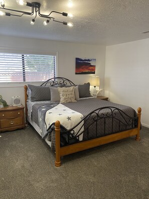 1 bedroom, desk, iron/ironing board, travel crib