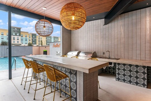 The Mercer *Freiheit Village Luxury Condo Complex