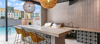 The Mercer *Freiheit Village Luxury Condo Complex