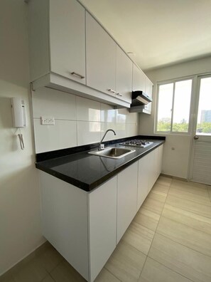 Stovetop - APARTASUITES RAMASA (Santa Marta)