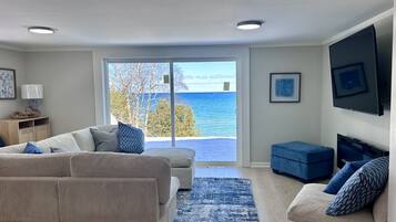 Smart TV, fireplace, table football, books