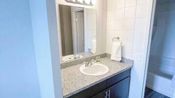 Hair dryer, towels, soap, shampoo