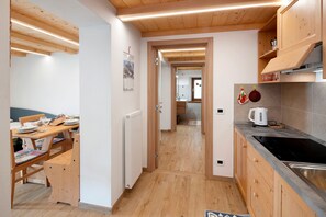 Fridge, stovetop, electric kettle, highchair