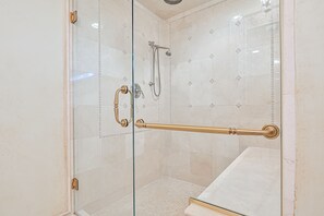 Shower, hair dryer, soap, toilet paper