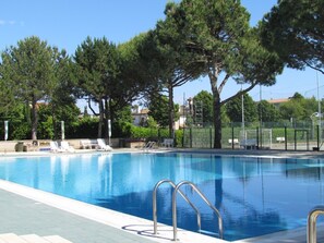Outdoor pool - Flat in a Residence With Sports Courts (San Michele al Tagliamento)