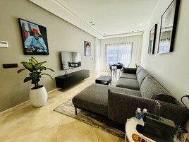 Premium-huoneisto, kaupunkinäköala | Oleskelualue | Älytelevisio, Netflix, suoratoistopalvelut