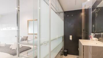 Shower, eco-friendly toiletries, hair dryer, towels