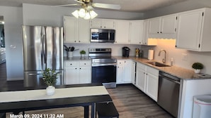 Coffee/tea maker, fridge, microwave, oven