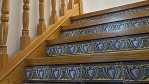 A wooden staircase with ornate blue and green tiles. - Fantastic Rural House:  300m2, 7 double rooms (up to 18 guests), Garden1100m2 (Villahoz)