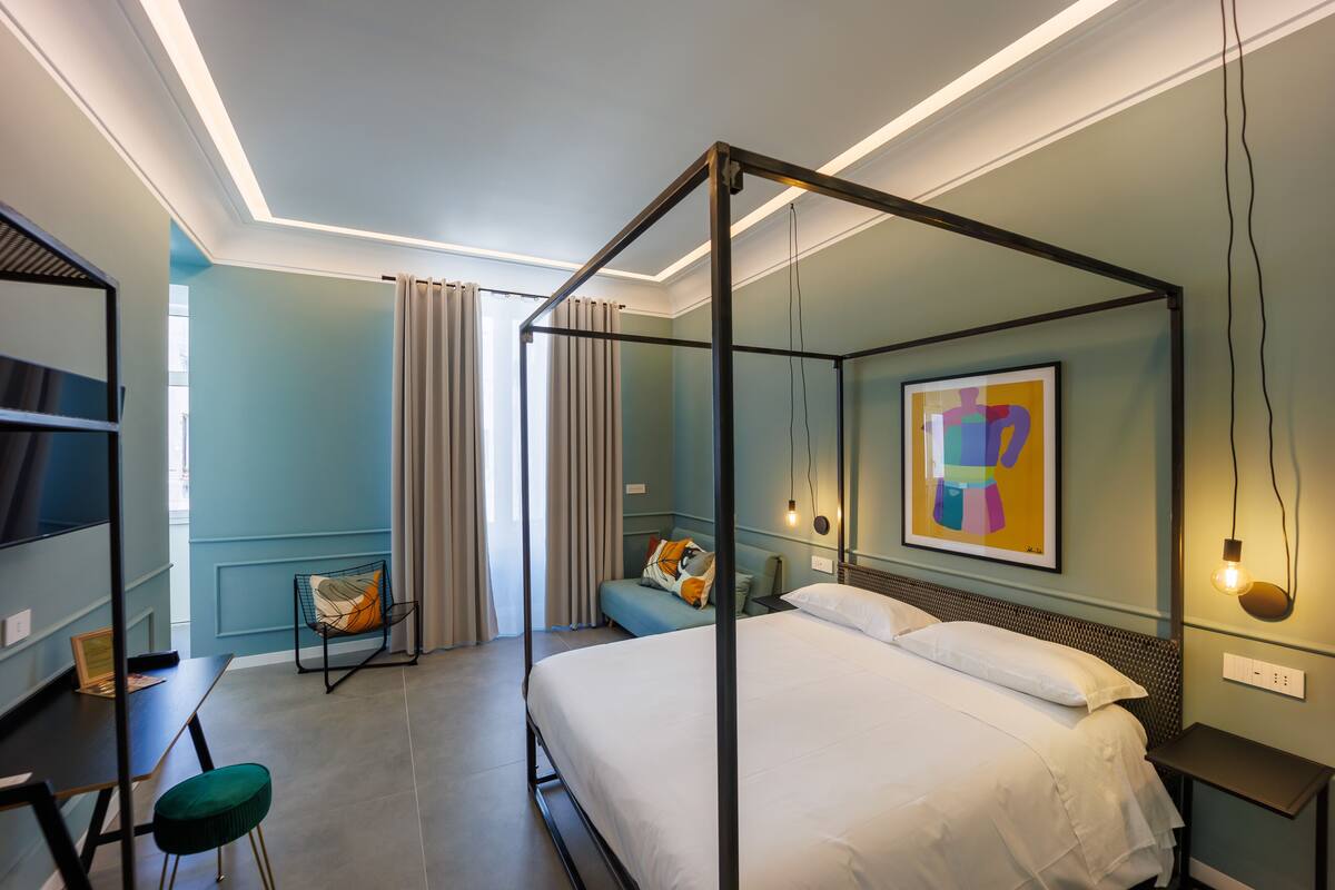 Design Quadruple Room | Premium bedding, down comforters, in-room safe, desk