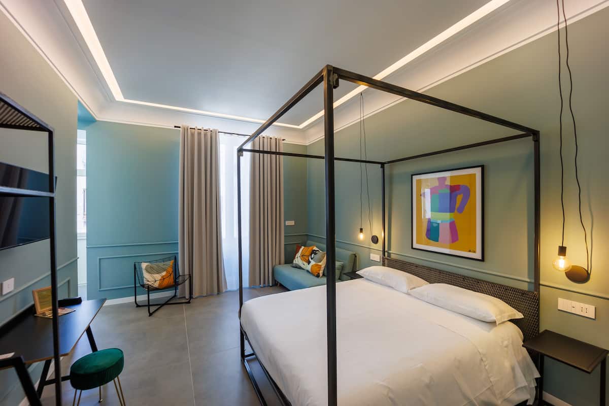 Design Quadruple Room | Premium bedding, down comforters, in-room safe, individually furnished