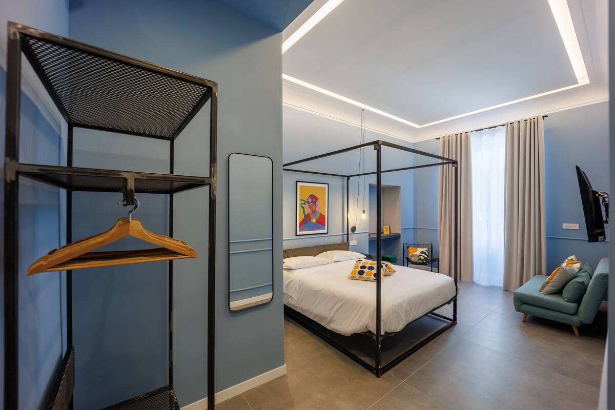 Design Quadruple Room | Premium bedding, down comforters, in-room safe, desk