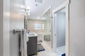 Shower, hair dryer, towels, soap