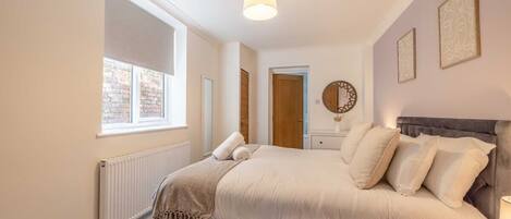 2 slaapkamers, een strijkplank/strijkijzer, wifi, beddengoed