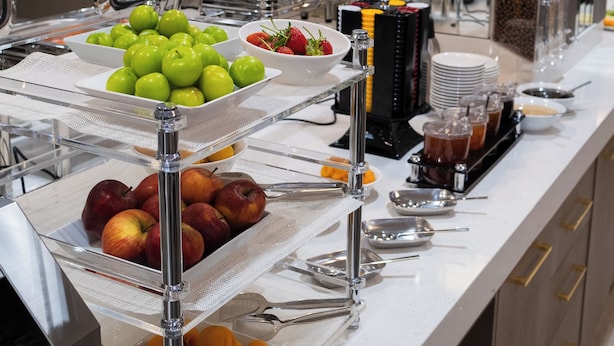A buffet setup with various fruits and beverages. - Buke Hotel Bomonti (Istanbul)