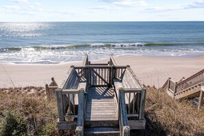 A wooden boardwalk leading to a beach with waves crashing onto the shore. - Laguna East #158 - 4 BD Oceanfront Home w/ Direct Beach Access! (North Topsail Beach)