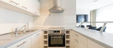 Family Condo, 3 Bedrooms, Executive Level | Private kitchen | Full-size fridge, microwave, stovetop, electric kettle