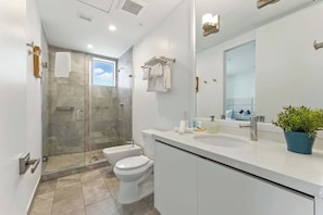 Shower, hair dryer, towels