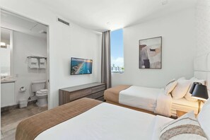 2 habitaciones, tabla de planchar con plancha, cuna de viaje y wifi