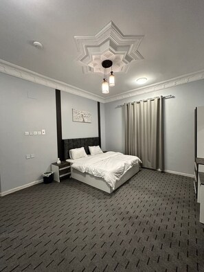 Suite Deluks | Kedap suara, setrika/meja setrika, Wi-Fi gratis, dan seprai linen