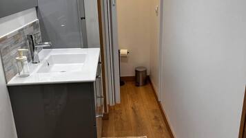 Shower, towels, toilet paper