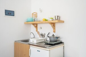 Deluxe Triple Room, Lanai, Sea View | Private kitchen | Fridge, stovetop, cookware/dishes/utensils