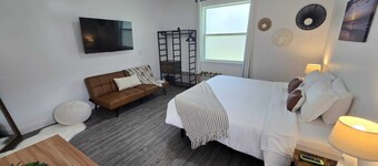 Private apt, king bed, full kitchen, huge shower.
