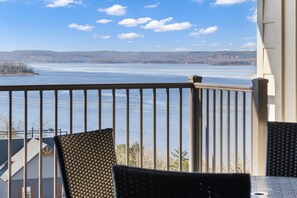 Outdoor dining - Lakefront Branson Stay • Sunroom Retreat + Balcony Views • (Branson)