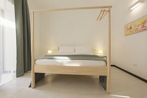 Habitación doble | Ropa de cama de alta calidad y edredones de plumas