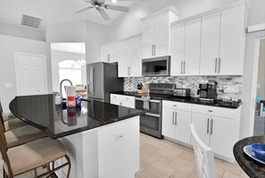 Coffee/tea maker, fridge, microwave, oven