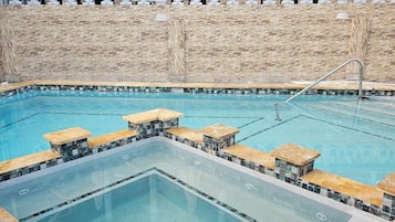 Outdoor pool, open 8:00 AM to 10:00 AM, pool umbrellas