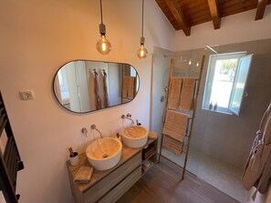 Shower, hair dryer, towels, soap
