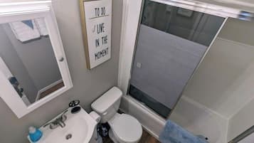 Hair dryer, towels, soap, shampoo