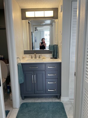Hair dryer, towels, soap, toilet paper